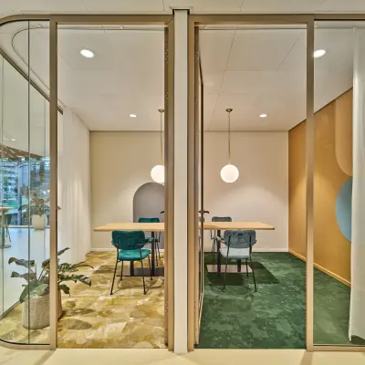 Modern office space with stylish furnishings, featuring a meeting room ideal for office space rental at Van Deventerlaan 30-40, Utrecht Papendorp.