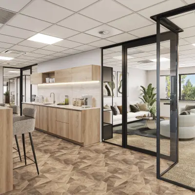 Modern, furnished office space with stylish interiors available for rent at Newtonlaan 115, Utrecht Rijnsweerd, featuring an open floorplan with a lounge area and kitchen facilities.