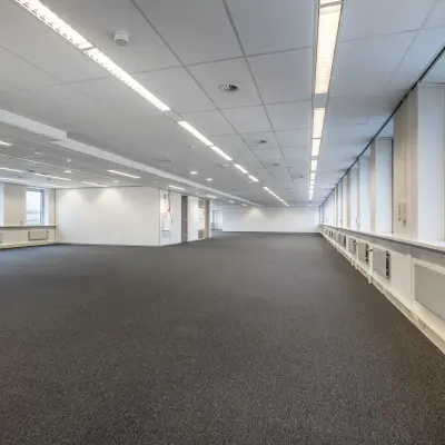 Spacious office space available for rental at De Run 1141-1157, Veldhoven, featuring ample lighting and a versatile layout.