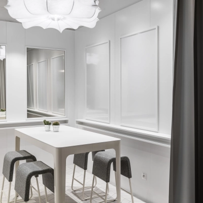 Stylish furnished office space with modern decor and seating at Konstruktorska 11, Warsaw Mokotow, available for rent office space needs.