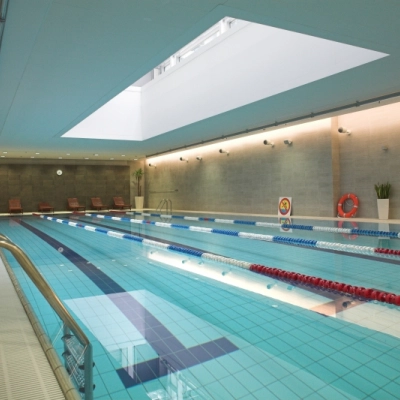Spacious indoor swimming pool at Postępu 17A, Warsaw Mokotow, perfect for relaxation during office breaks. Consider this unique office space rental opportunity.