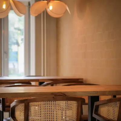 Chic office space to rent featuring modern lighting and wooden furnishings at Vijzelmolenlaan 9, Woerden.