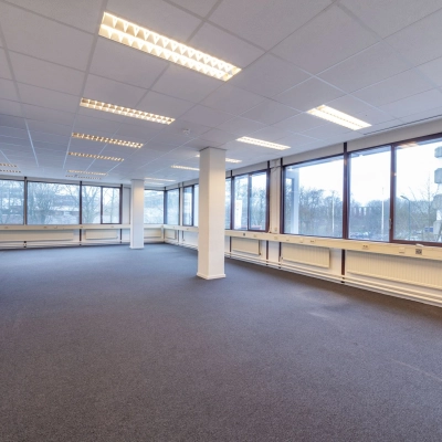 Spacious office to rent at Zaagmolenlaan 4, Woerden, featuring large windows and ample lighting, ideal for office space rental.