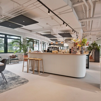 Modern office space at Hanzelaan 351-361, Zwolle with open layout featuring a reception area and seating. Ideal office space rental offering vibrant and welcoming environment.