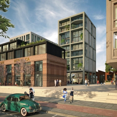 De buitenkant van een modern kantoorpand aan Papaverhof 58 in Amsterdam Noord, met mensen die langs het gebouw wandelen. Perfect om kantoorruimte te huren midden in een levendige omgeving.