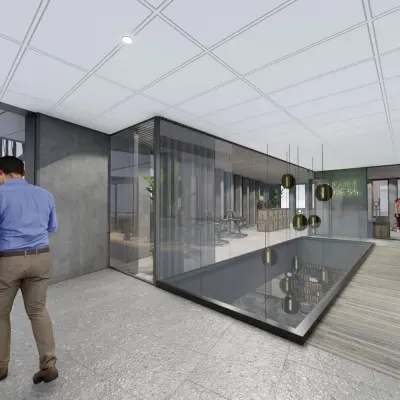 Moderne kantoorruimte aan Jachthavenweg 109, Amsterdam Zuidas met glazen wanden en houten vloeren. Personen voeren zakelijke gesprekken en lopen door de gang. Kantoorruimte huren op deze locatie biedt zakelijke mogelijkheden.
