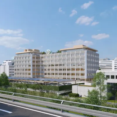 Kantoorpand op Marten Meesweg 101 in Rotterdam Alexander met grote ramen en omringd door groen, te huur voor kantoorruimte.